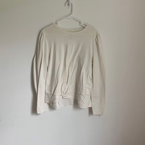 Cream long sleeved blouse